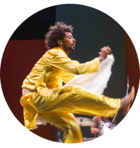 Addis Ababa transit tour-Yellow dresses dancer melaku profile pic showing legs horizontal