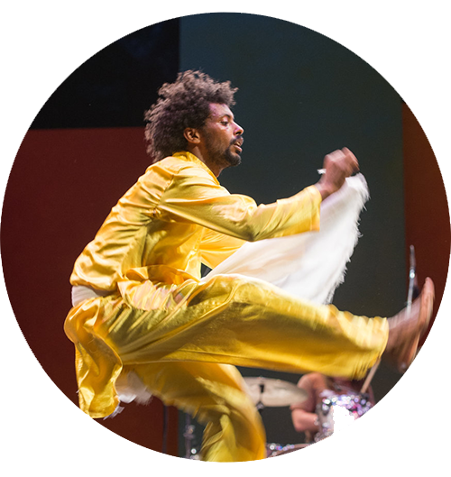 Addis Ababa transit tour-Yellow dresses dancer melaku profile pic showing legs horizontal