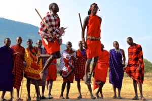 massai mara tribes in red cultural dresses -jumping higher:1 week exciting Mara safari